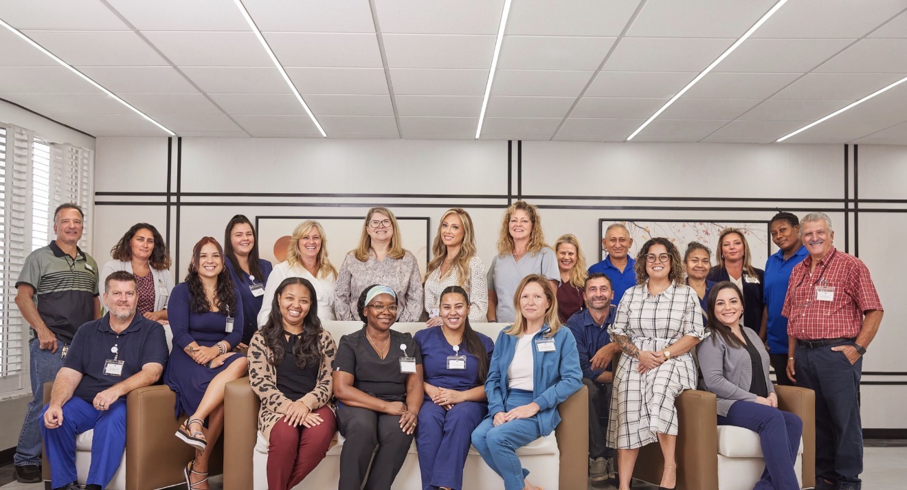 The full Village Place staff portrait — nurses, aides, therapists, leadership